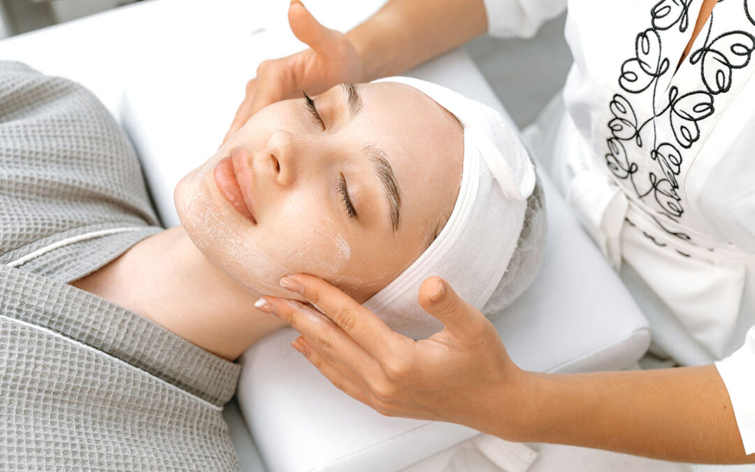 Woman receiving facial skin care procedure