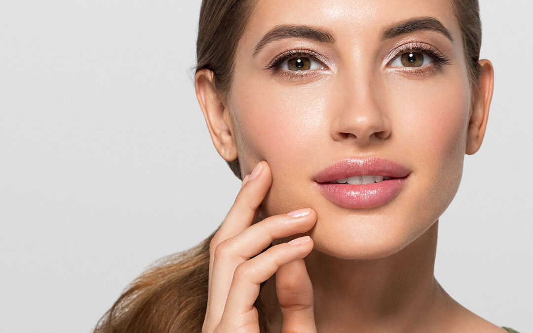 Beauty woman face healthy skin beautiful eyes close up